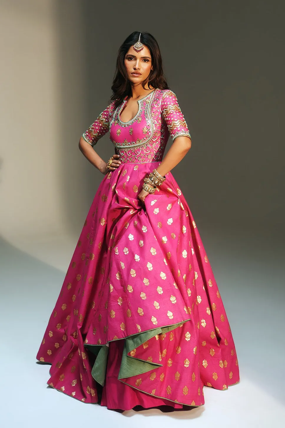 Fuchsia Pink Lehenga with Gold Buti Motifs and Embroidered Blouse