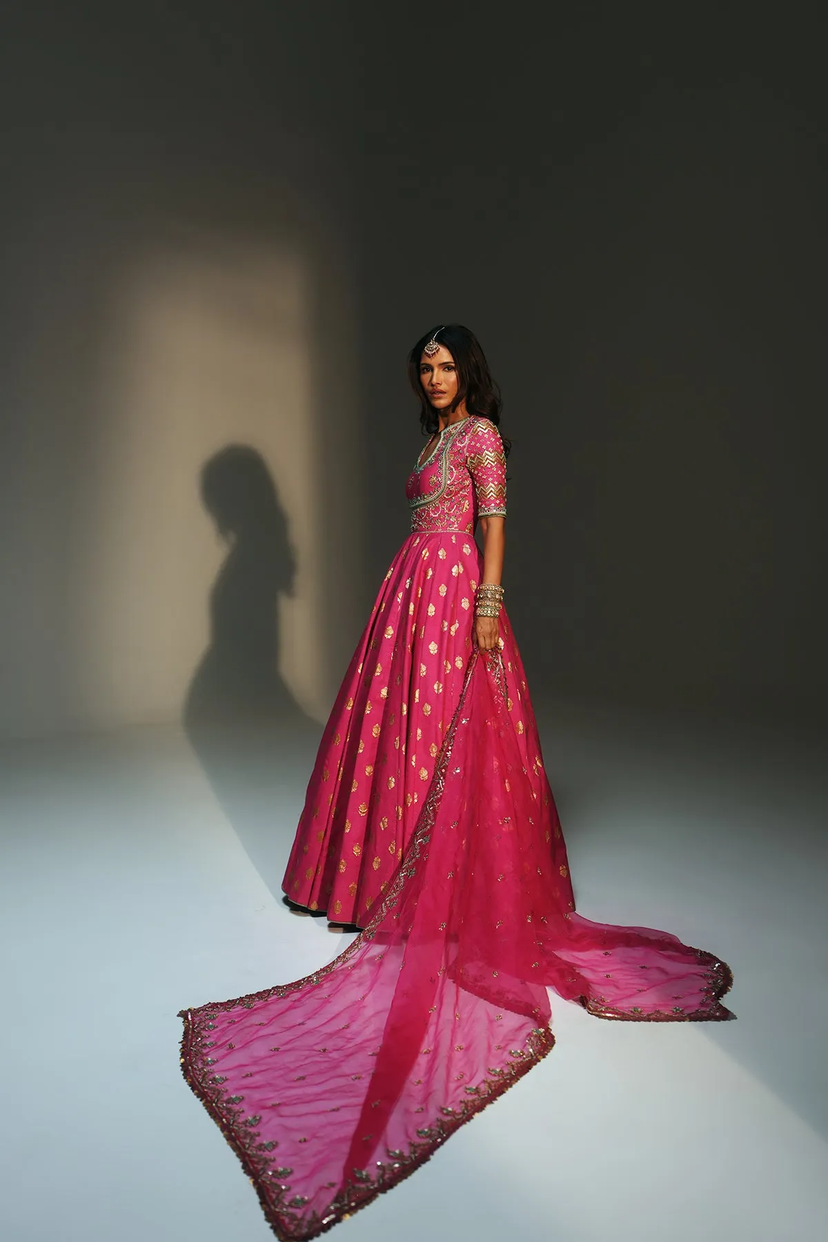 Fuchsia Pink Lehenga with Gold Buti Motifs and Embroidered Blouse