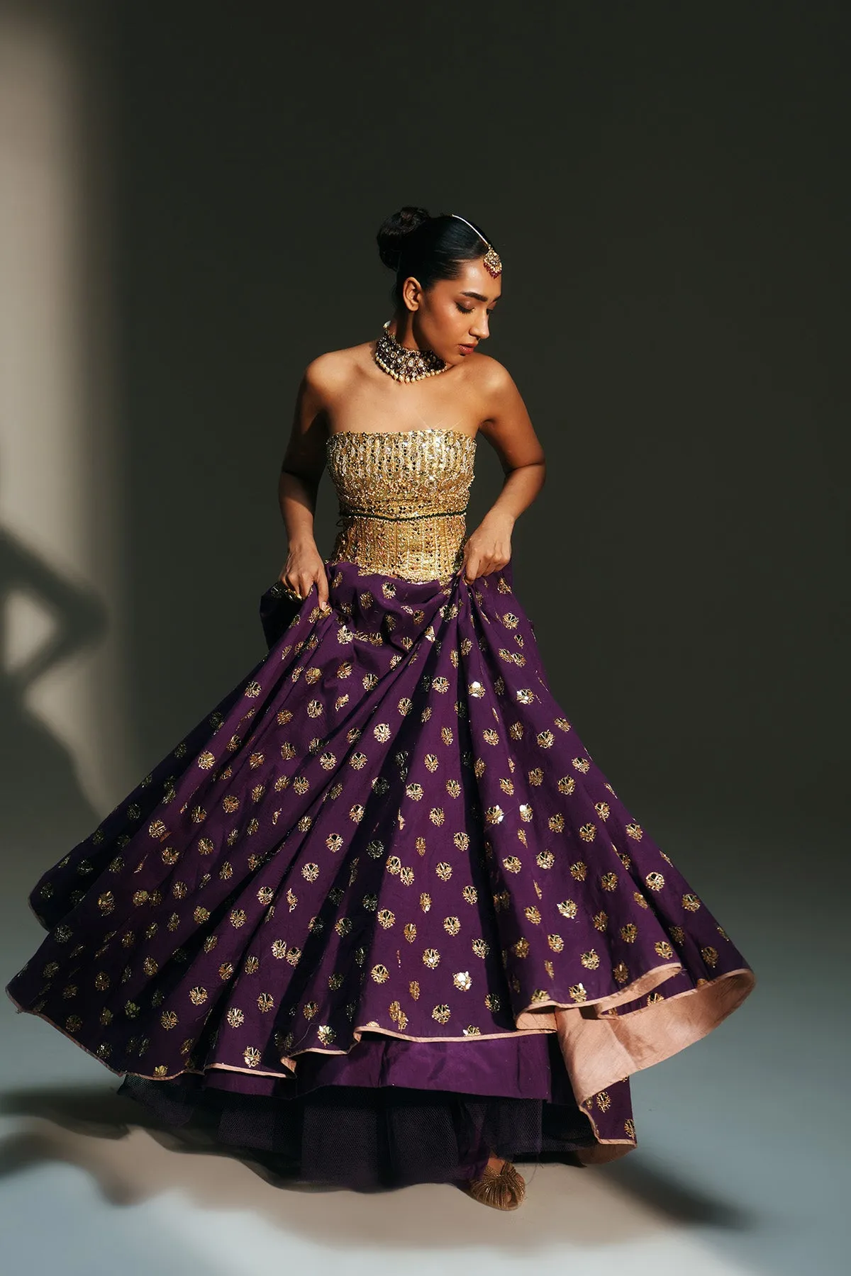 Royal Plum Lehenga with Gold Corset Blouse