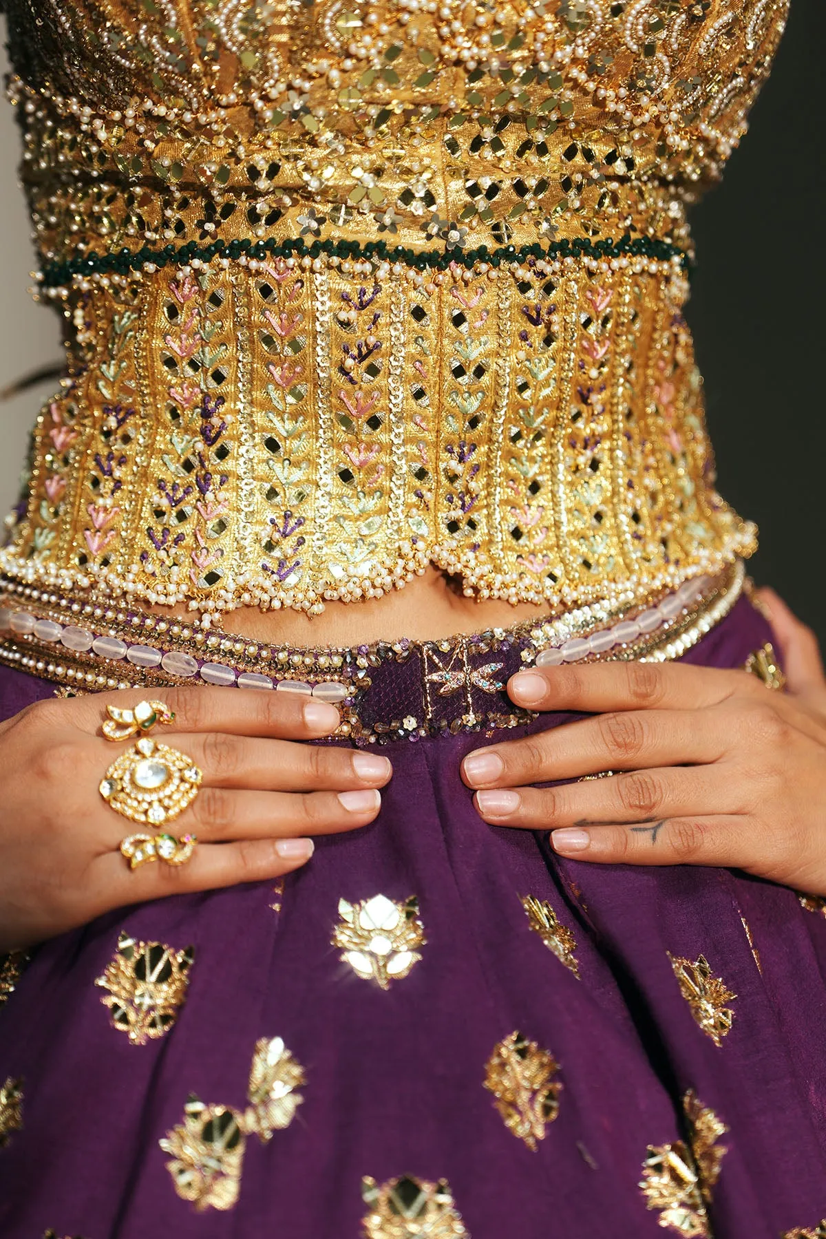 Royal Plum Lehenga with Gold Corset Blouse