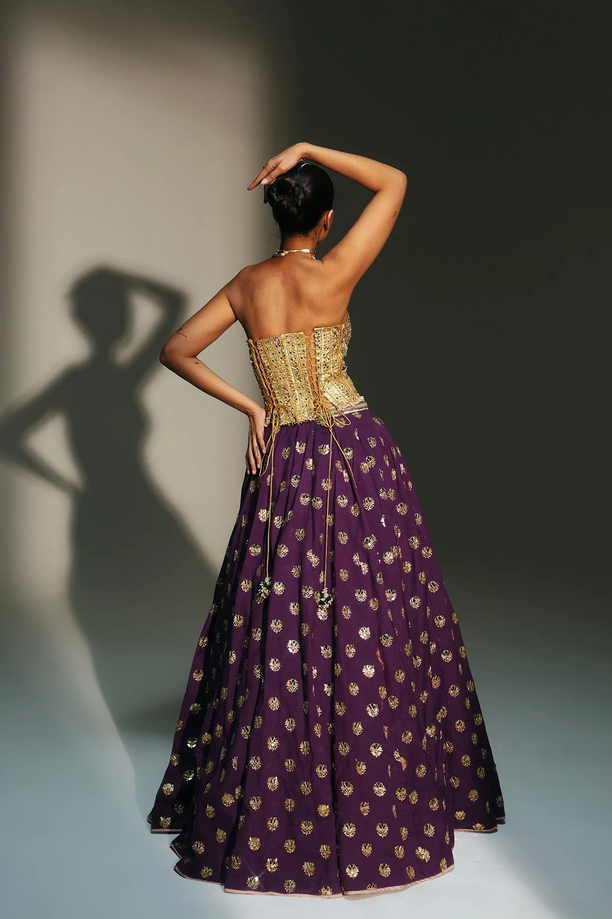 Royal Plum Lehenga with Gold Corset Blouse