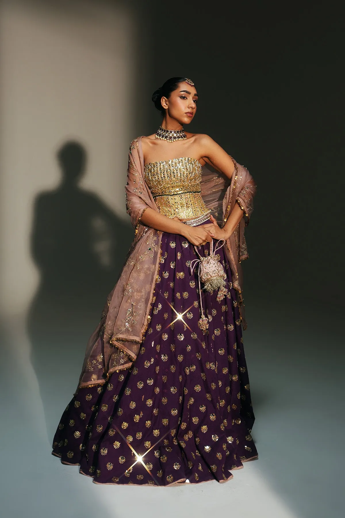 Royal Plum Lehenga with Gold Corset Blouse