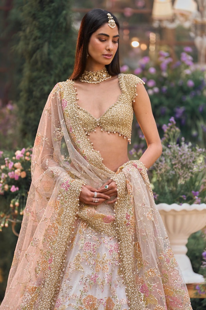 Blush Ivory Lehenga with Gold Zardozi and Pastel Floral Embroidery