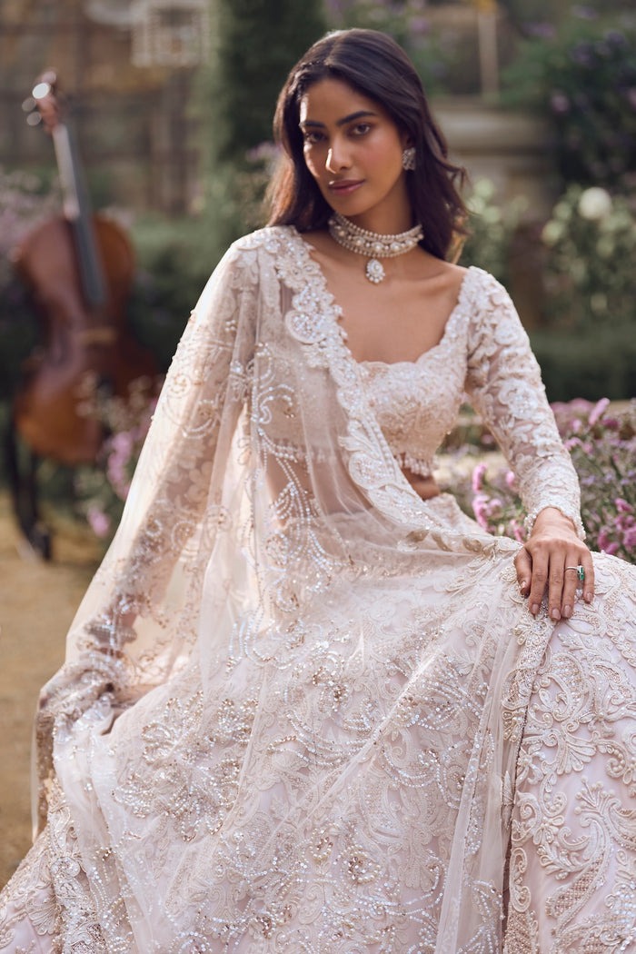 Ivory Lehenga with Intricate Resham Threadwork and Sequin Embroidery