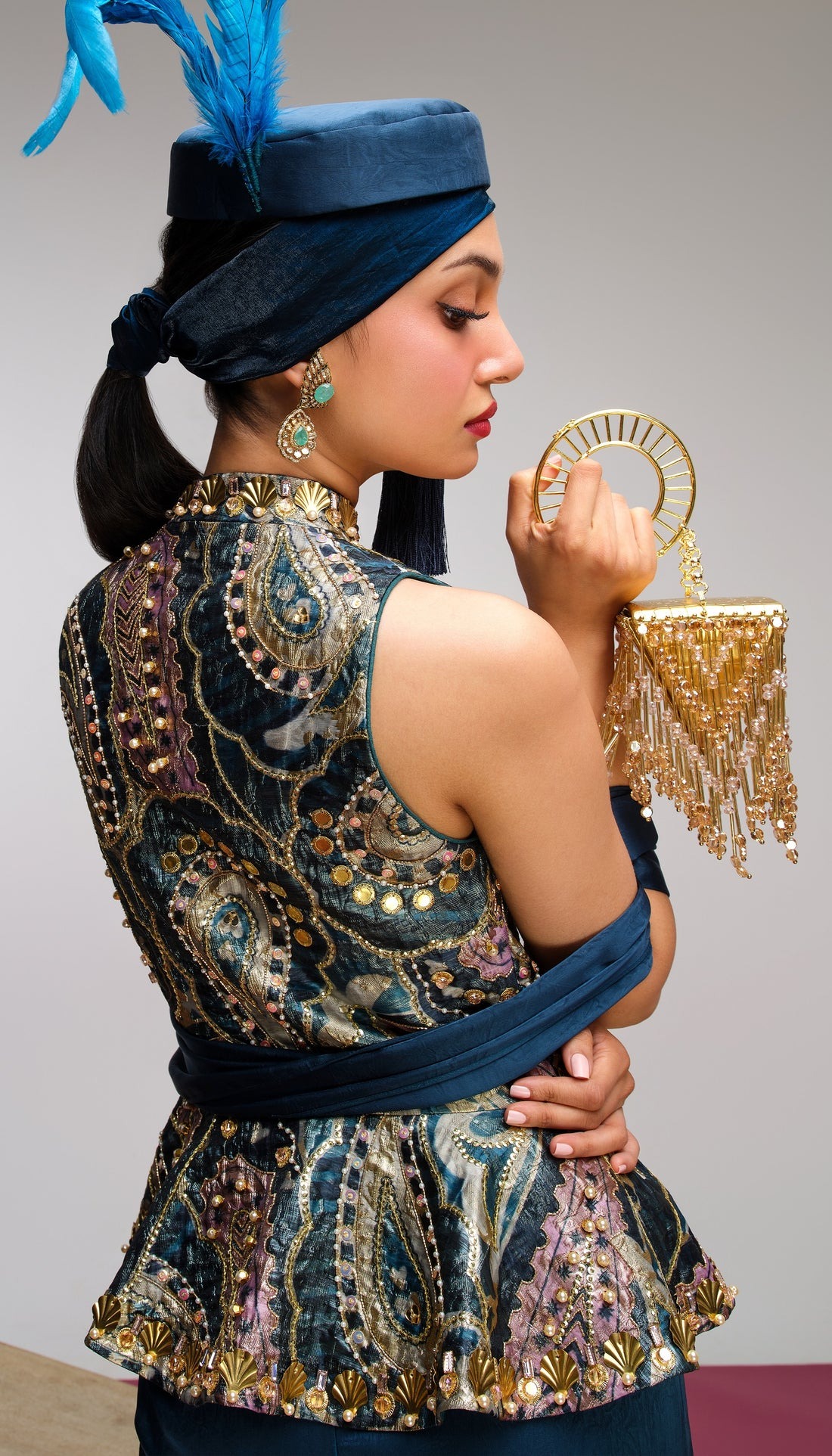 Teal Embellished Peplum Top with Handworked Motifs and Draped Flared Trousers