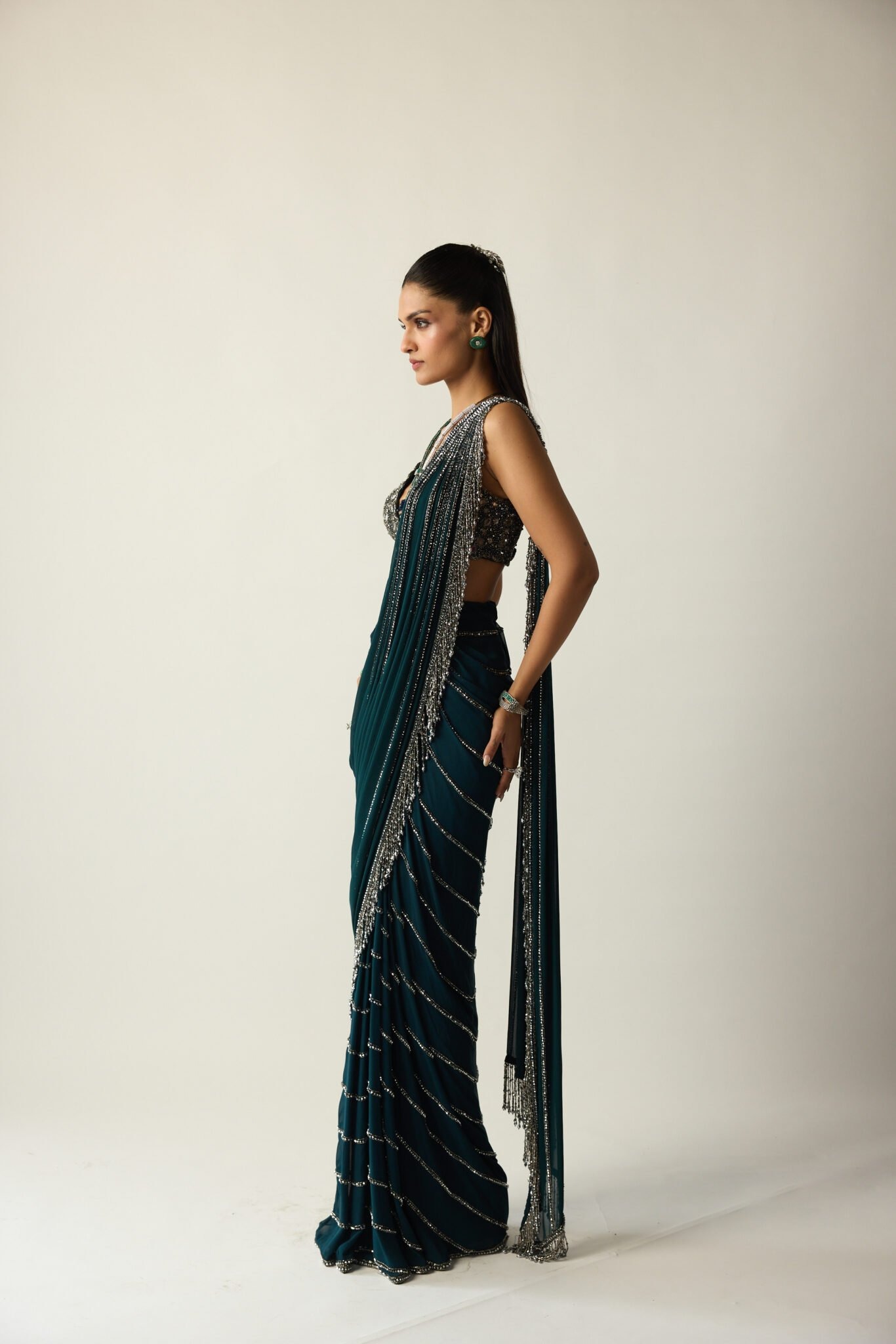 Emerald Green Draped SarI with Silver Crystal Embellishments and Mirror-Work Blouse