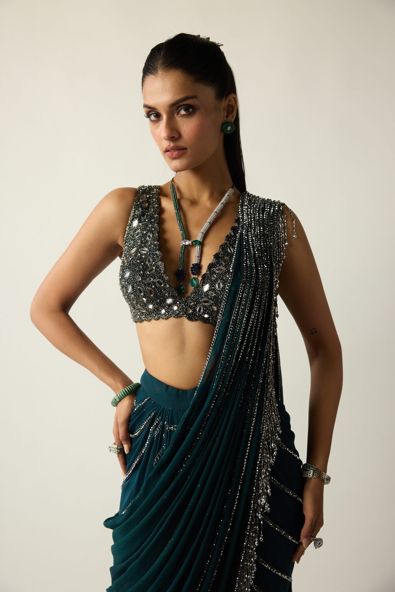 Emerald Green Draped SarI with Silver Crystal Embellishments and Mirror-Work Blouse