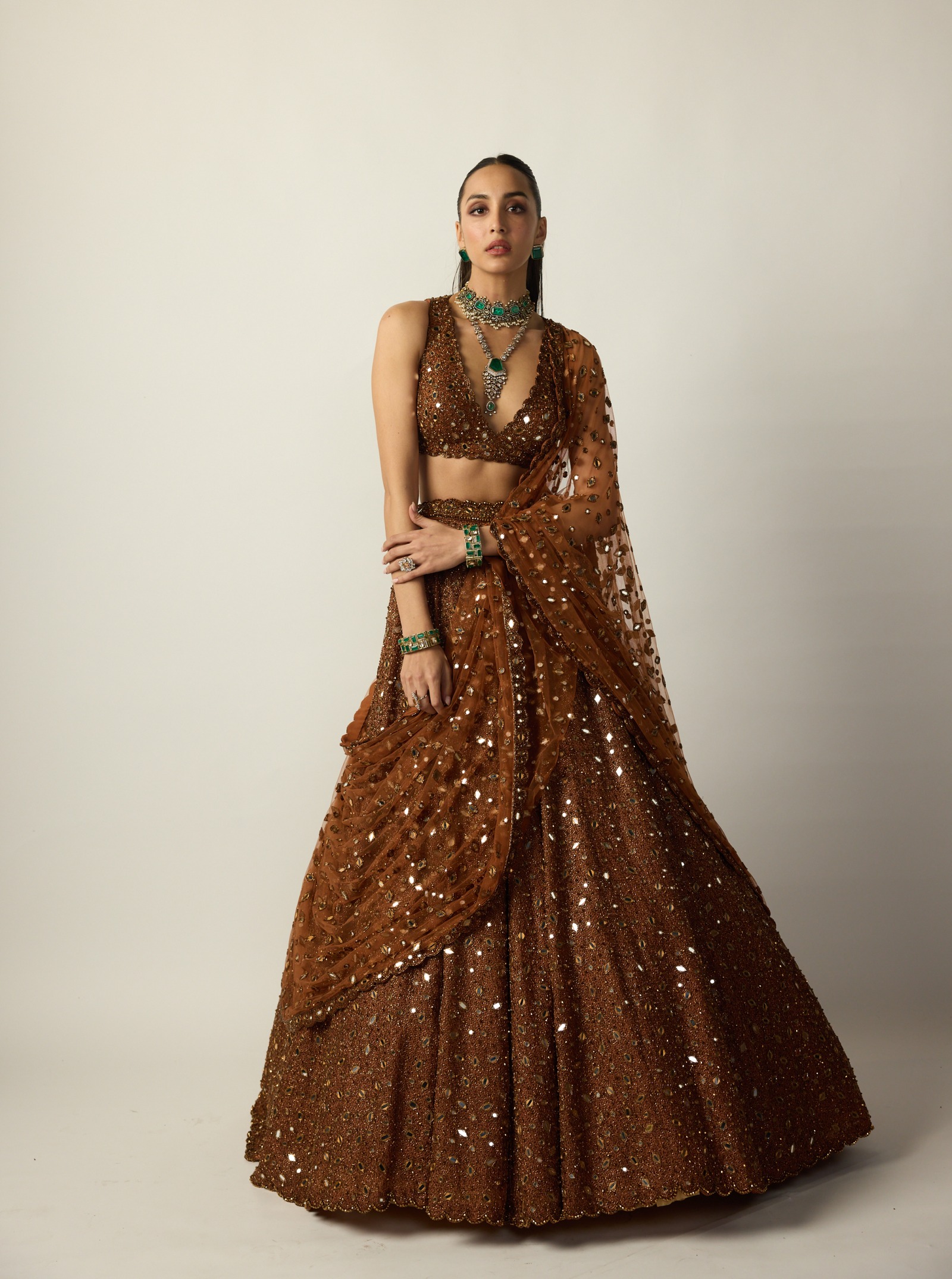 Burnished Copper Lehenga with Mirror Embellishments and Sheer Draped Dupatta
