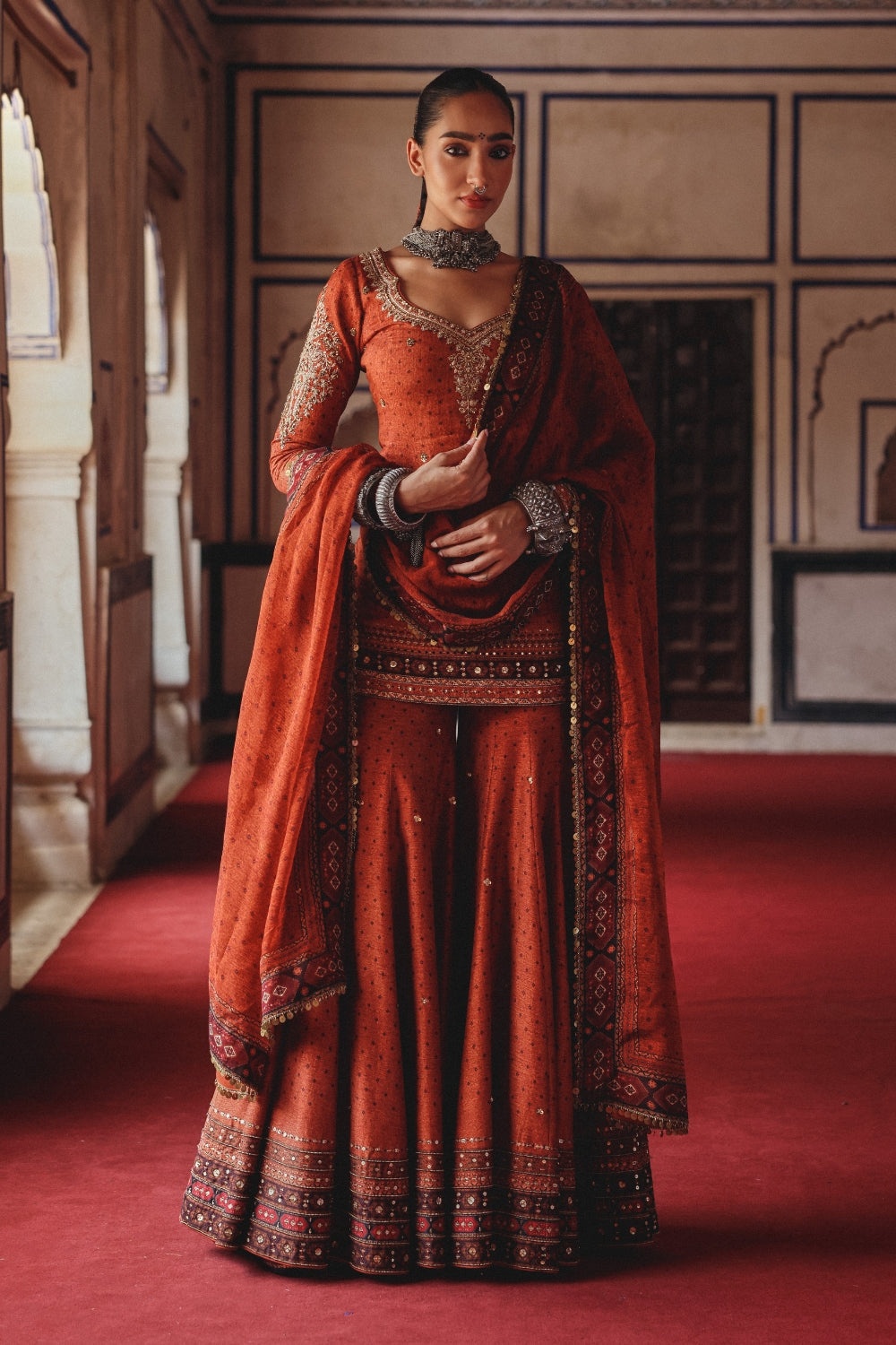 Rust Orange Sharara Set with Antique Gold Embroidery and Heritage Border Dupatta