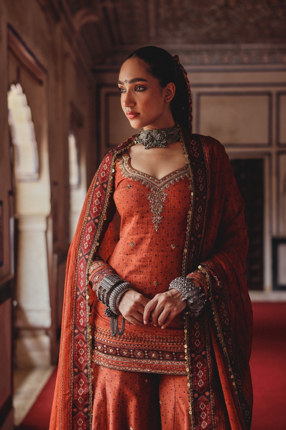 Rust Orange Sharara Set with Antique Gold Embroidery and Heritage Border Dupatta