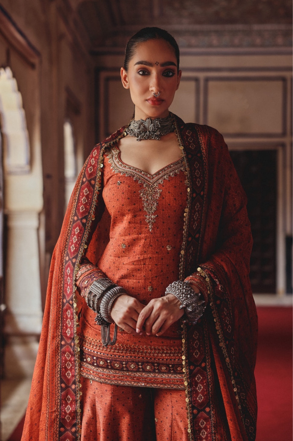 Rust Orange Sharara Set with Antique Gold Embroidery and Heritage Border Dupatta