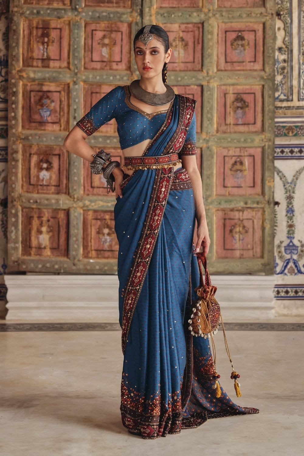 Teal Blue Sari with Antique Gold Motifs and Heritage Border Embroidery