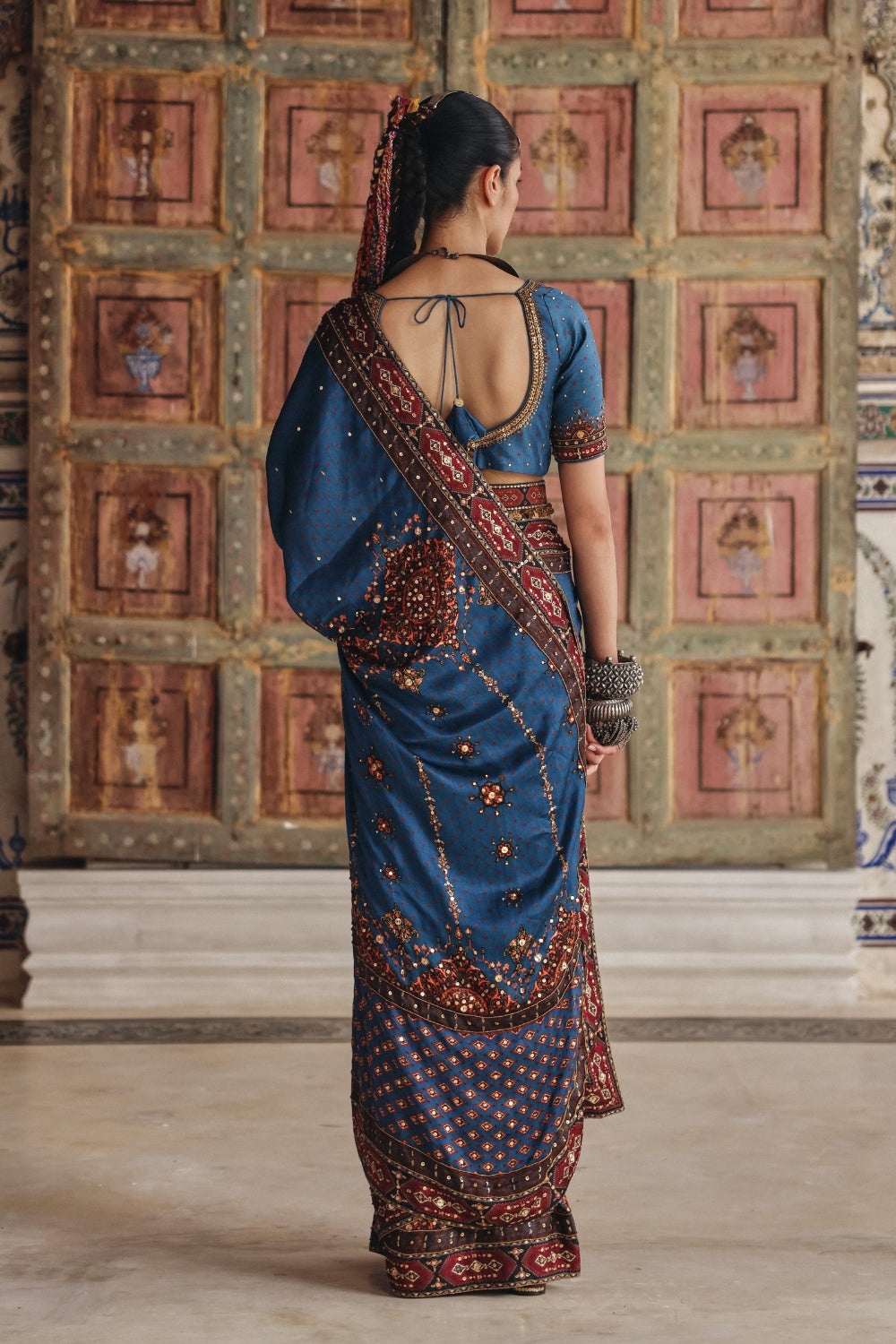 Teal Blue Sari with Antique Gold Motifs and Heritage Border Embroidery