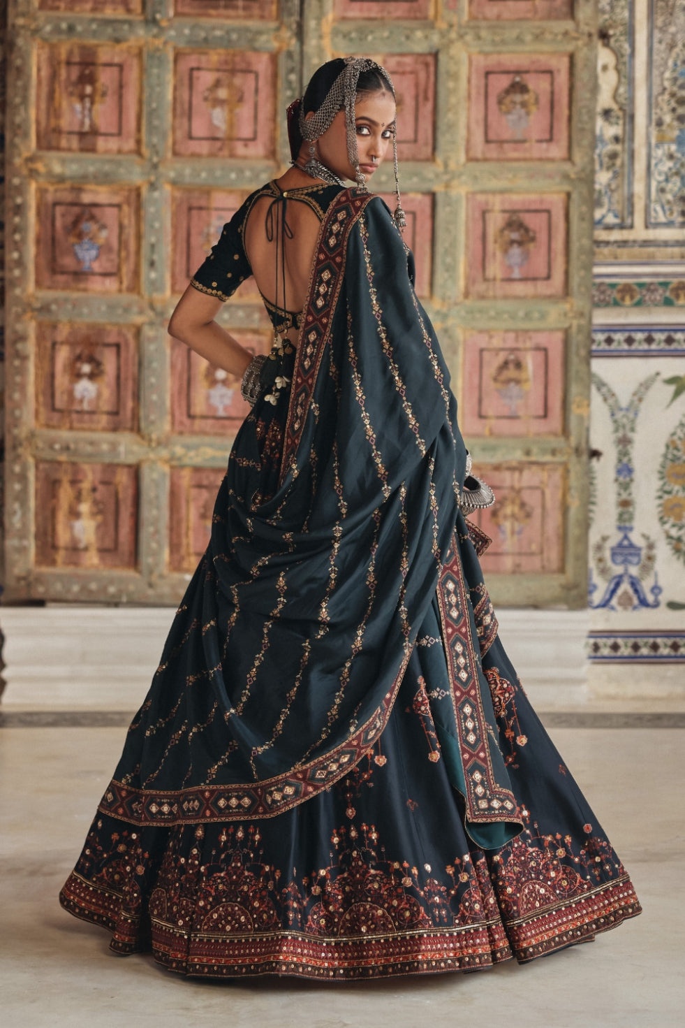 Deep Teal Lehenga with Antique Gold Mirrorwork and Heritage Motif Embroidery