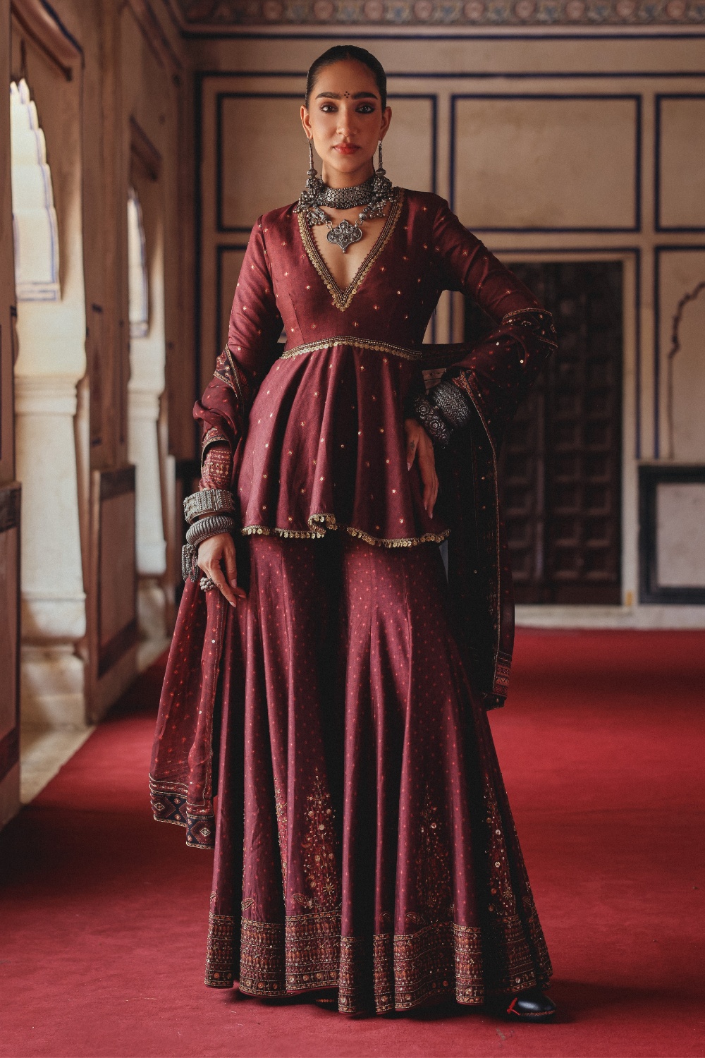 Deep Maroon Peplum Sharara Set with Antique Gold Embroidery and Heritage Border Dupatta