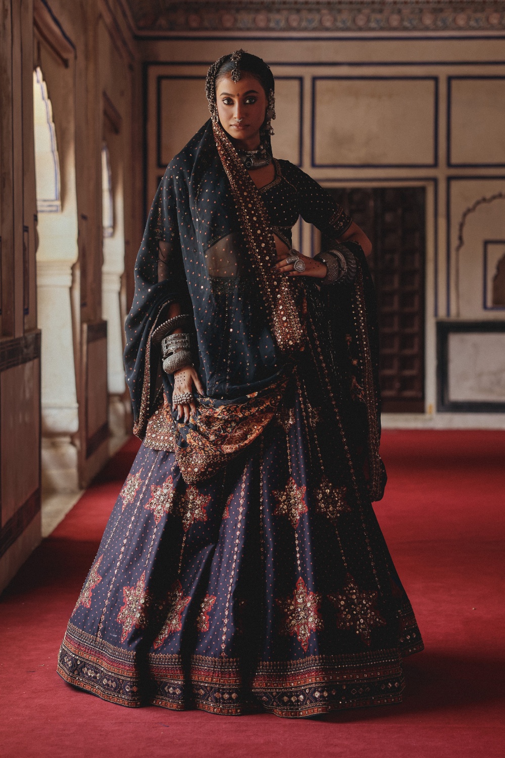 Midnight Indigo Lehenga with Antique Gold Starburst Embellishment and Mirrorwork Dupatta