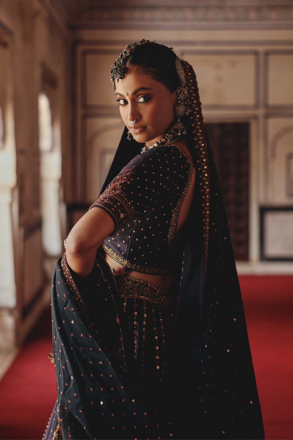 Midnight Indigo Lehenga with Antique Gold Starburst Embellishment and Mirrorwork Dupatta