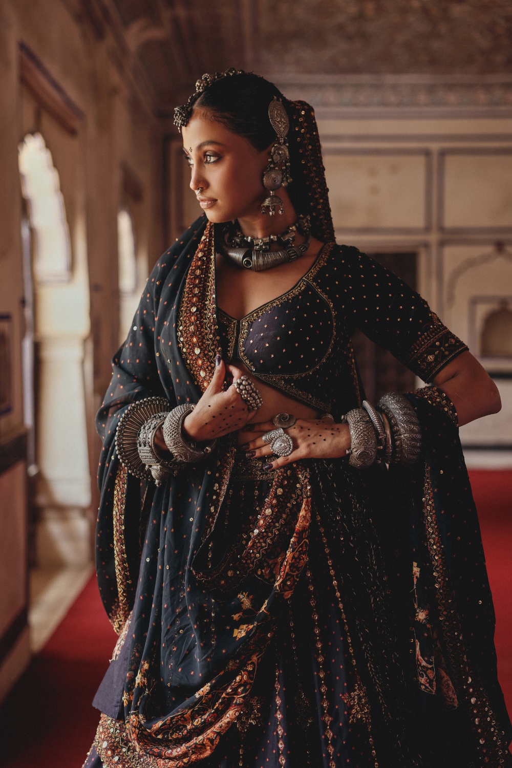 Midnight Indigo Lehenga with Antique Gold Starburst Embellishment and Mirrorwork Dupatta