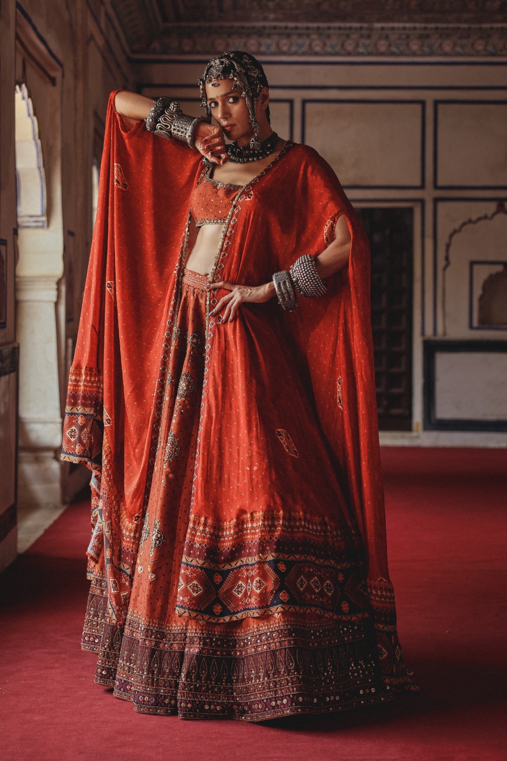 Burnt Coral Lehenga with Antique Mirrorwork and Draped Cape Dupatta