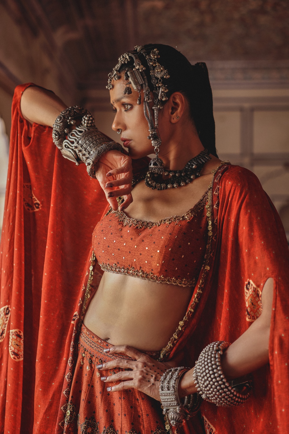 Burnt Coral Lehenga with Antique Mirrorwork and Draped Cape Dupatta