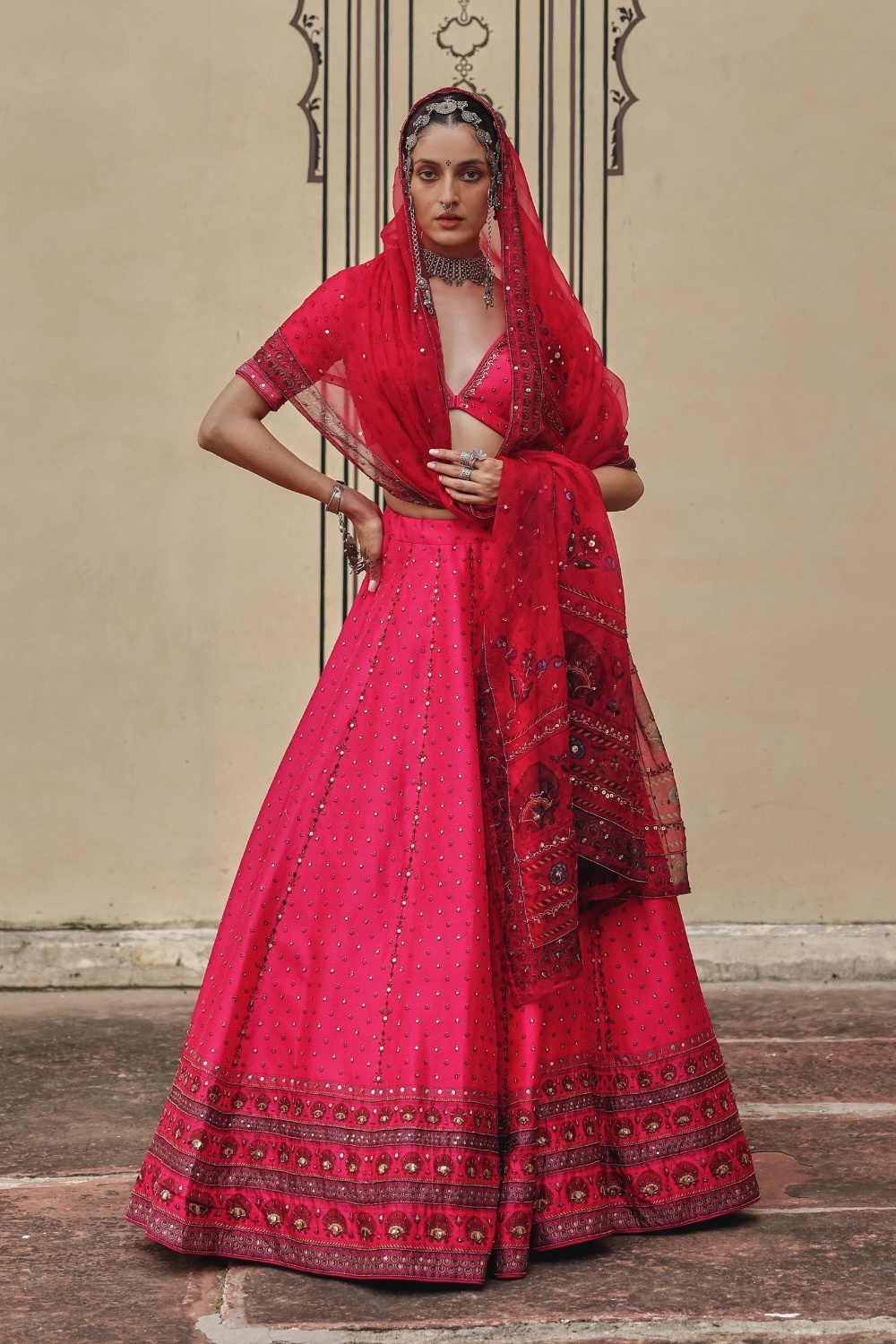 Fuchsia Pink Lehenga with Mirror Embellishments and Heritage Border Dupatta