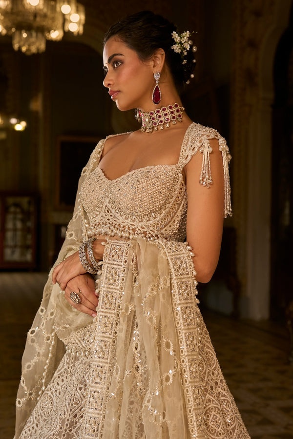 Ivory Bridal Lehenga with Pearl Embroidery and Geometric Handcrafted Detailing