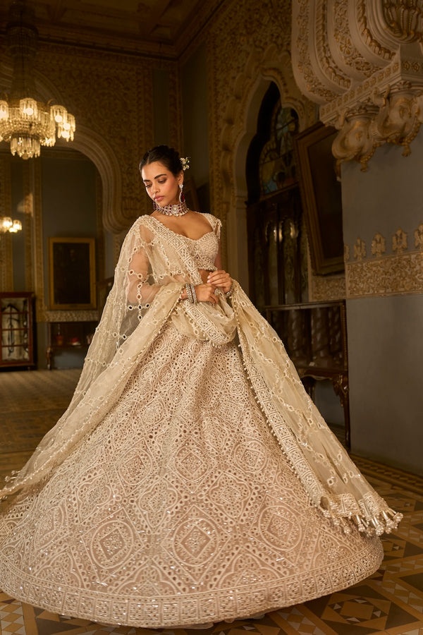 Ivory Bridal Lehenga with Pearl Embroidery and Geometric Handcrafted Detailing