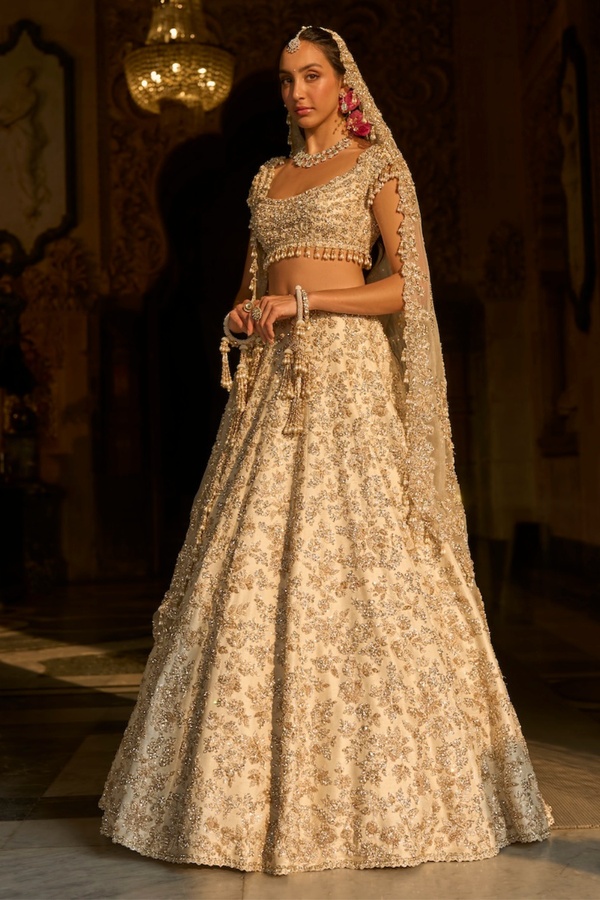 Ivory Bridal Lehenga with Silver Floral Embroidery and Pearl Tassel Blouse