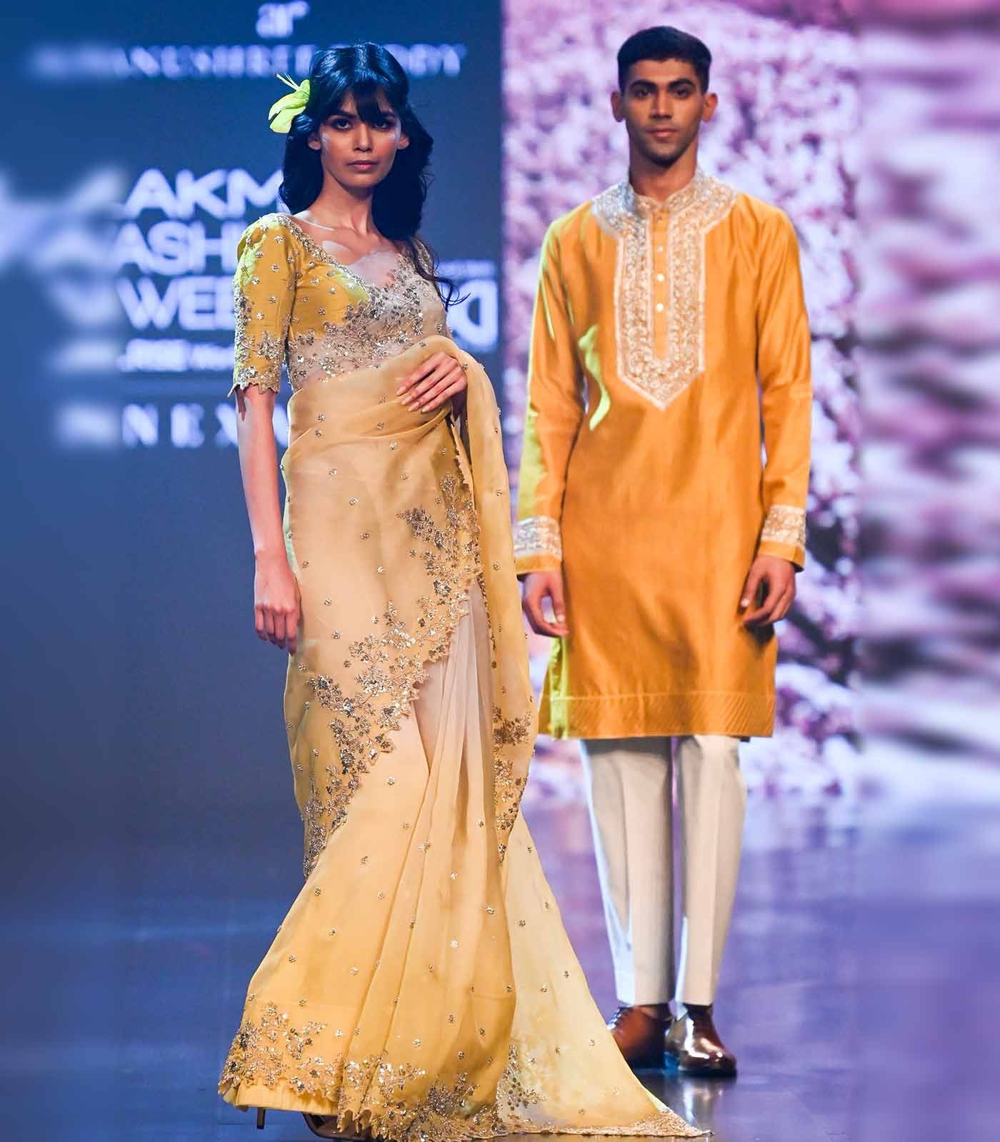 Butter Yellow Sari with Silver Embroidery and Embellished Border
