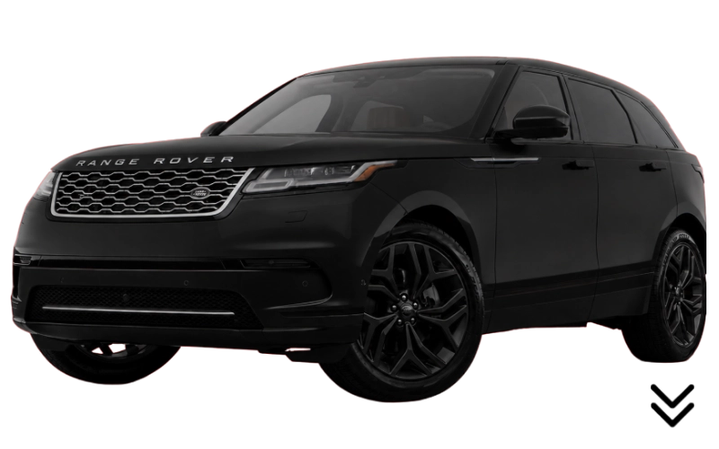 Black Range Rover Velar SUV with sleek design and tinted windows.