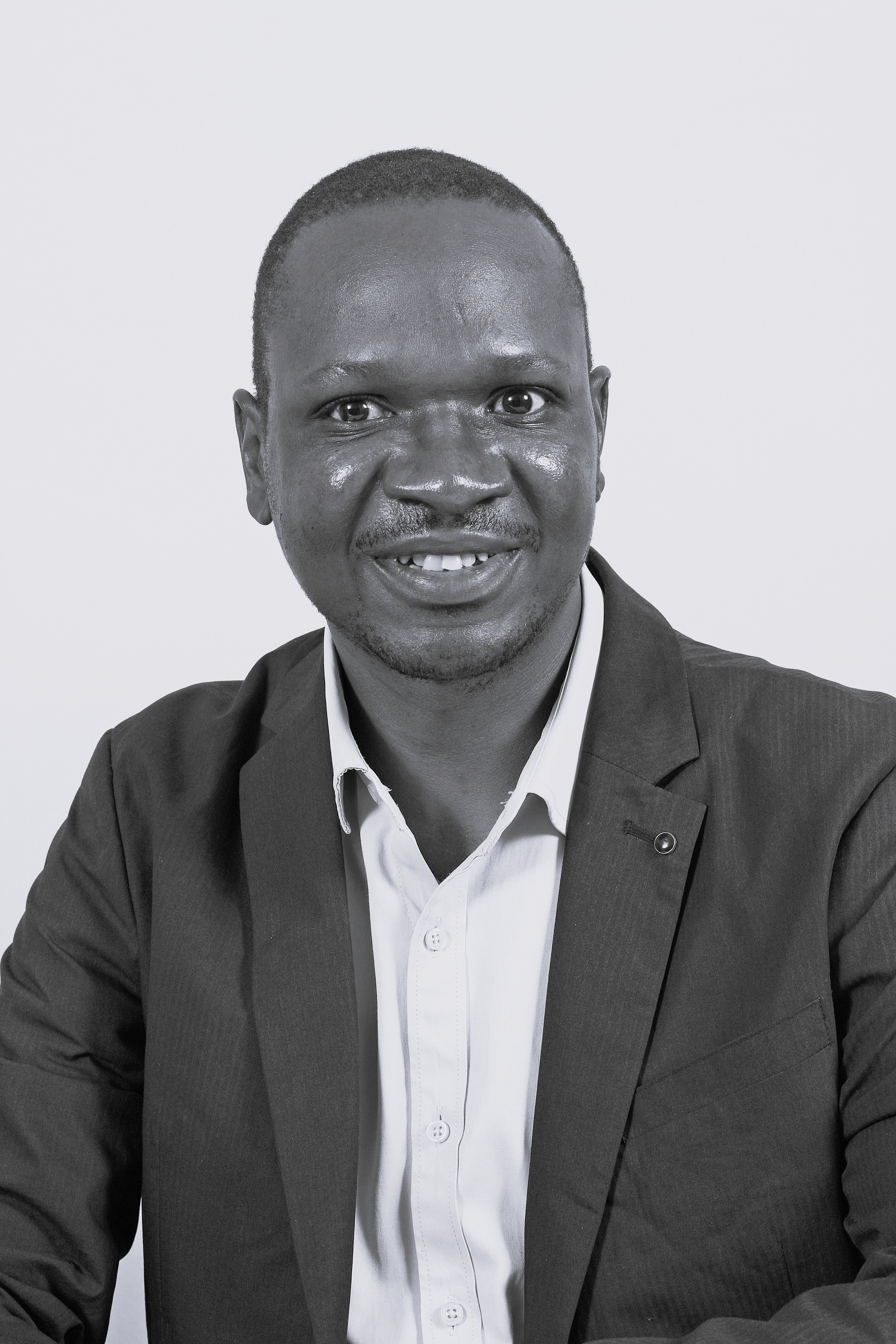 Black and white headshot of Lucky Ncube.