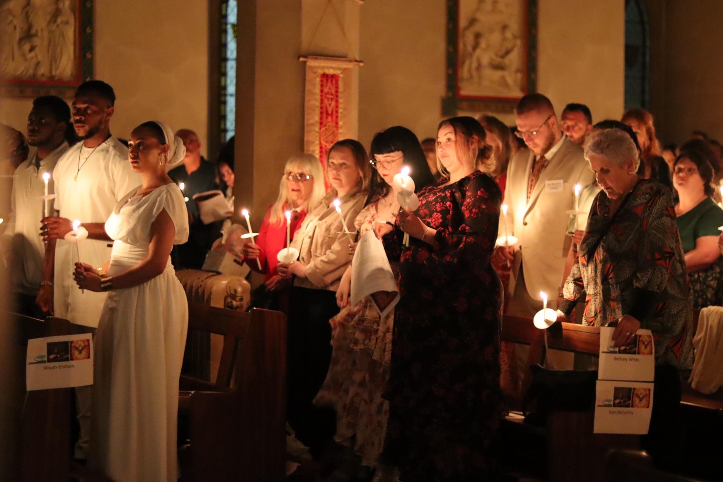 A night of light: 249 new Catholics welcomed across the Diocese