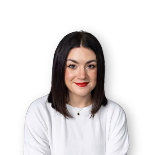 Kobieta z ciemnymi prostymi włosami, czerwoną szminką i białą bluzką na czarnym tle.