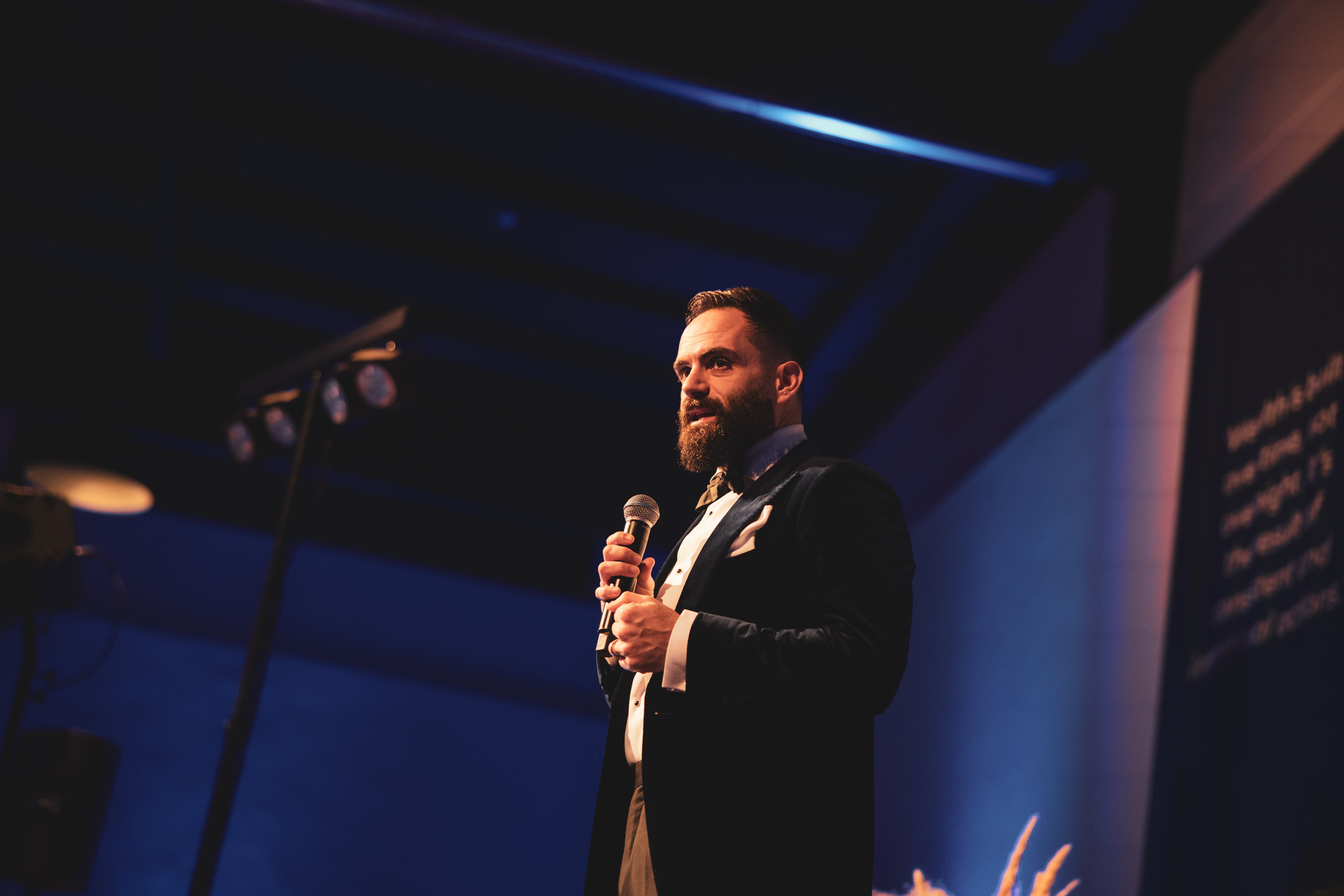 Man shaking hand in team meeting