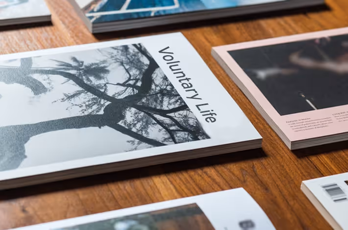 Multiple booklets placed on a table.