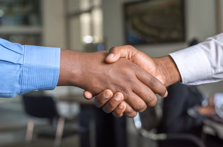 Close up image of a hand shake. 