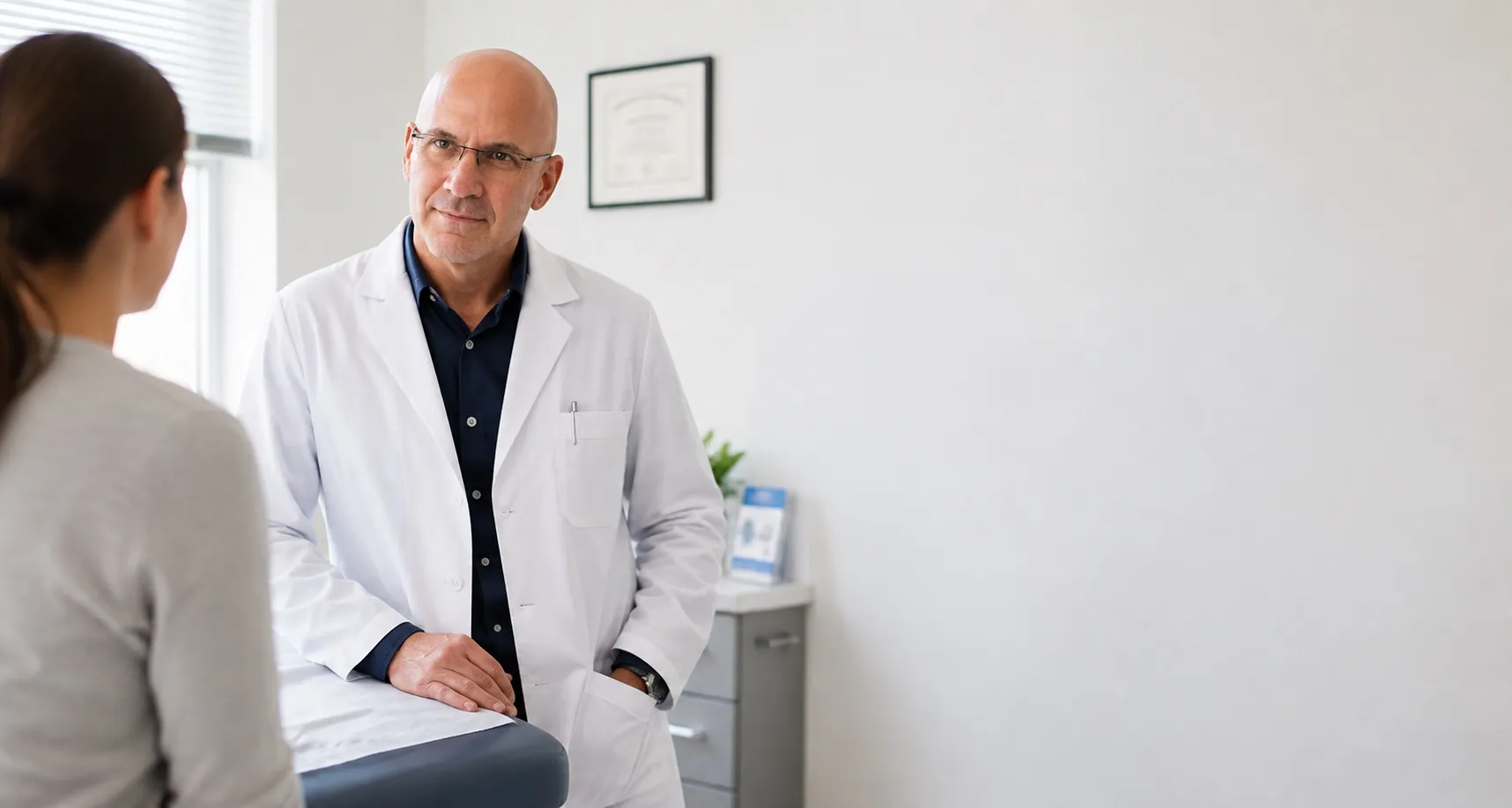 Dr. Jonathan Hodor consulting with a patient