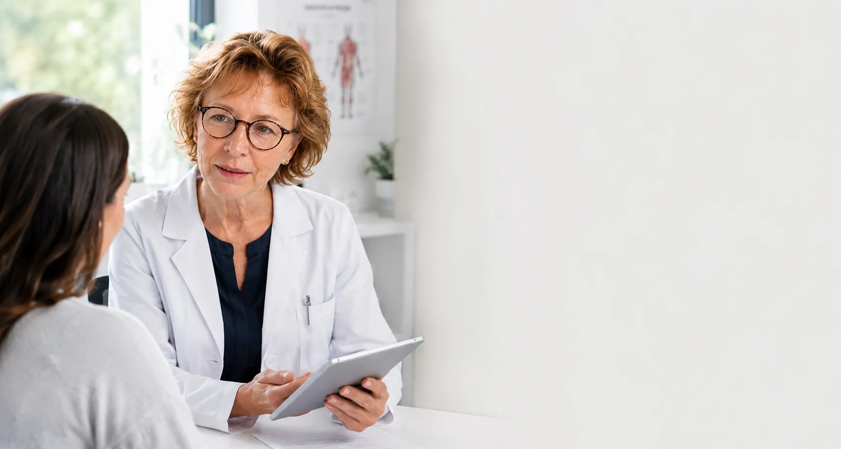 Dr. Julie Graves consulting with a patient