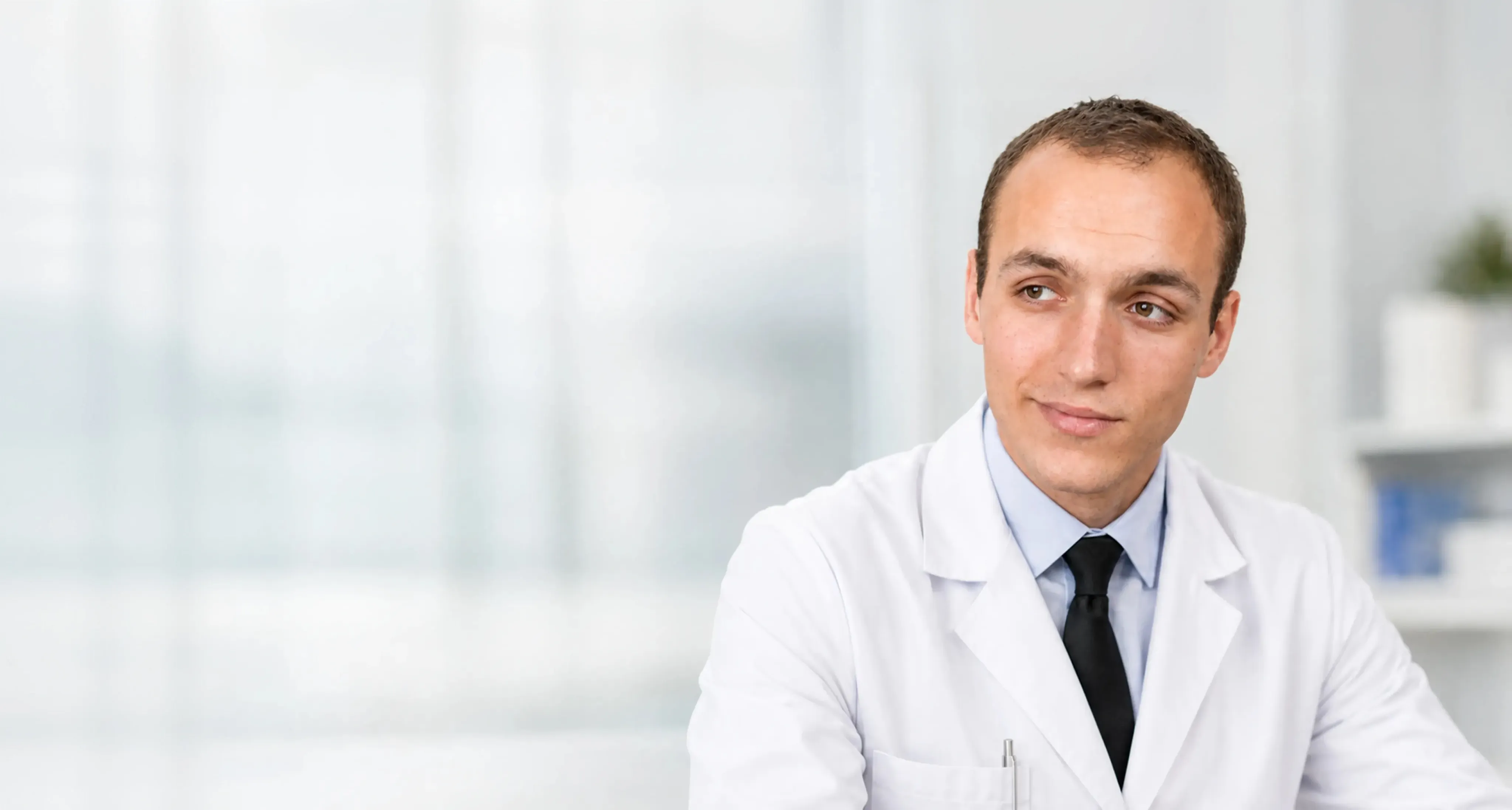 Dr. Phillip Ulyanovskiy, MD in his clinic