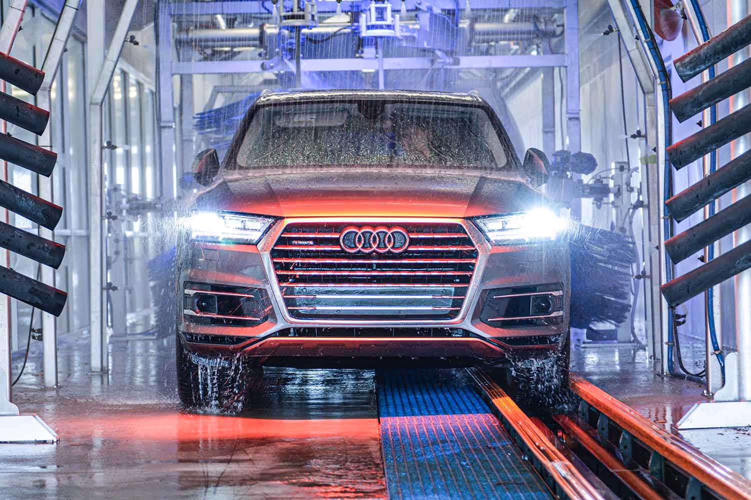 An Audi automobile is washed in the Harper Auto Wash tunnel.