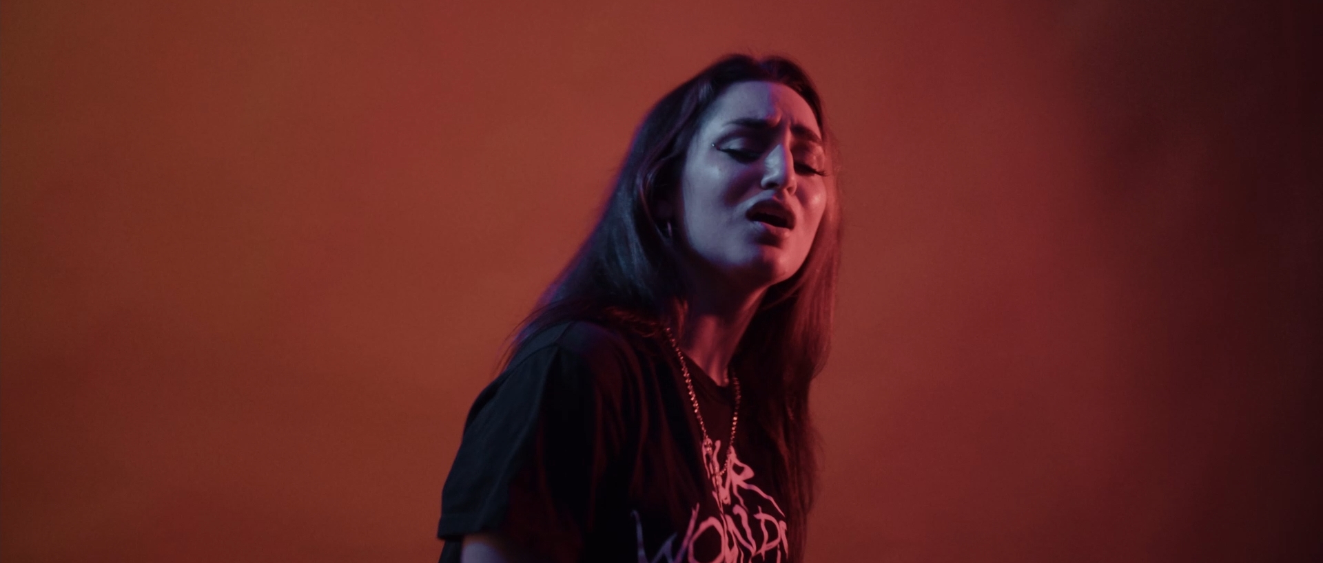 a still frame of Isabella Armina in a music video