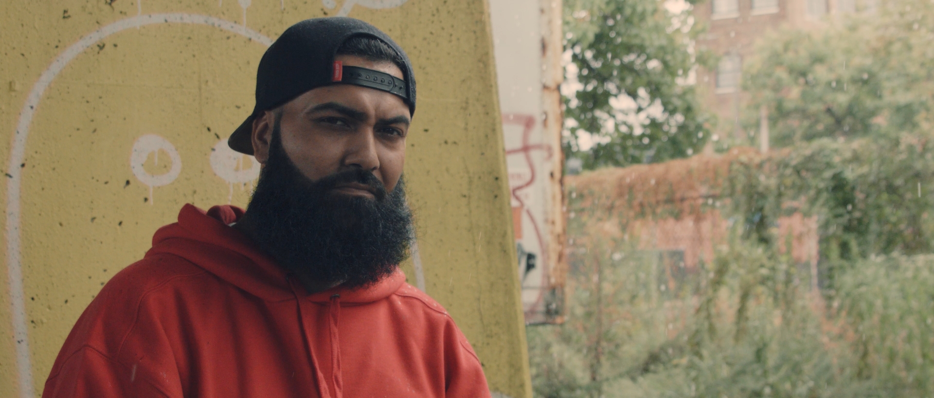 A still frame of Prodi da Prodigal in "Raindrops" Music Video