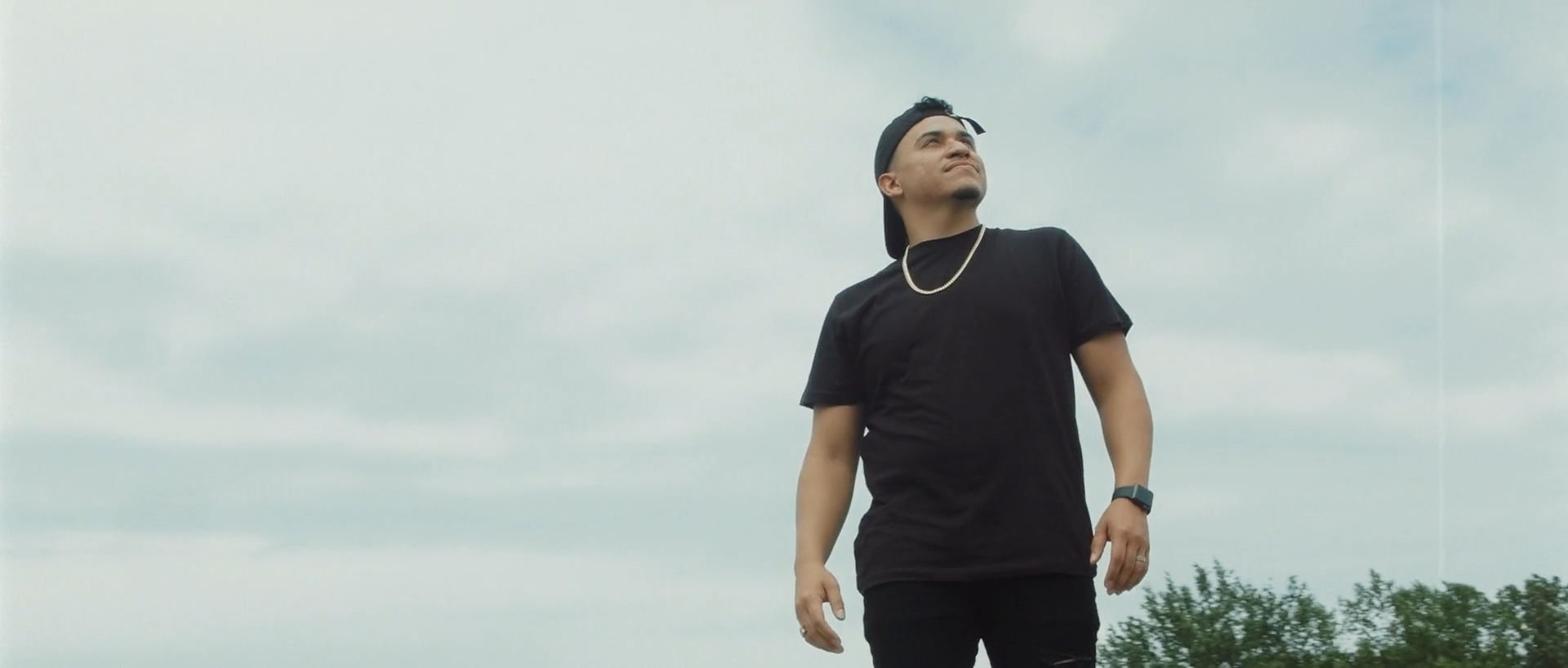 A Still frame of A-Ram in "Run it up" Music video Ft Loso