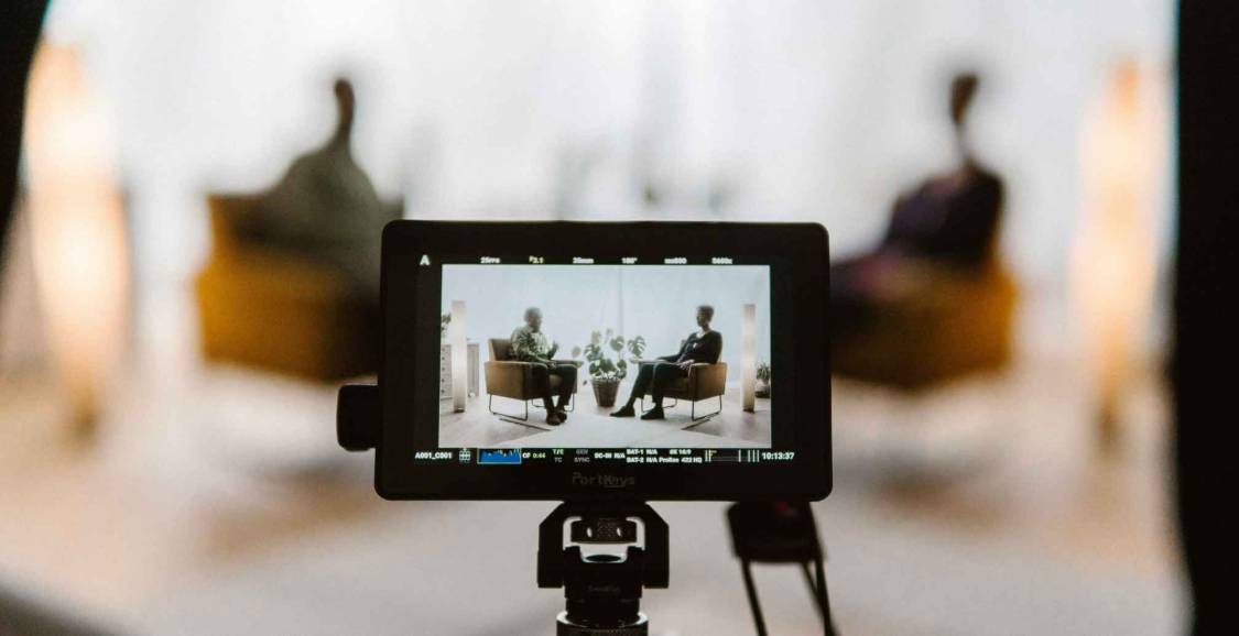 Studio setup with multiple cameras, set up for a talk show scenario