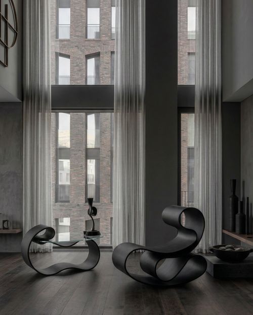 Evolve rocking chair in black — 3D printed i 100% recyclable biocomposite chair by Reform Design Lab
