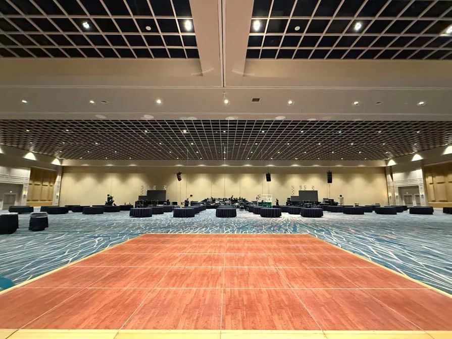 The Faine House Gala ballroom set with an open dance floor before doors