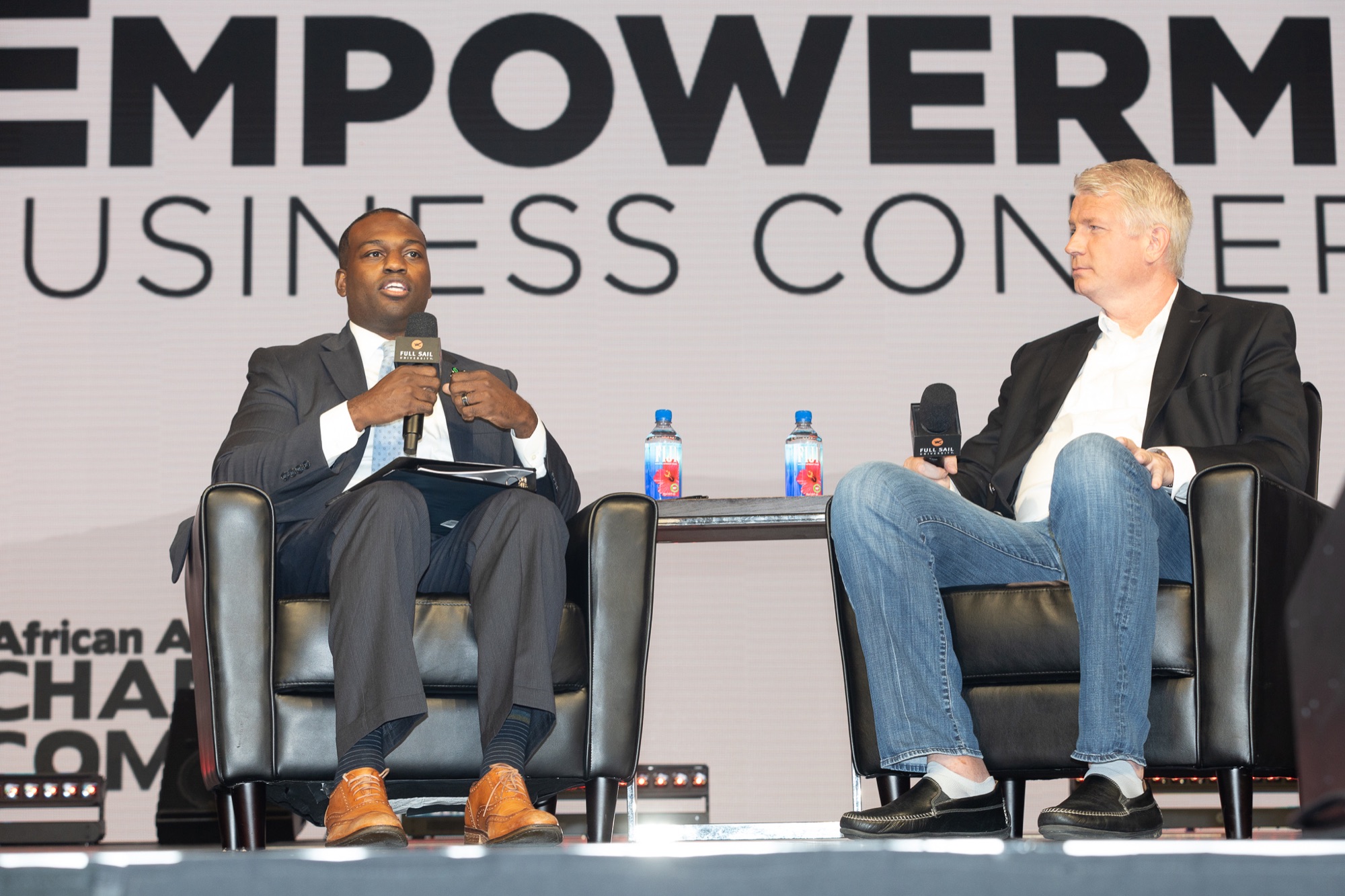 A fireside conversation on stage at the Empowerment Business Conference