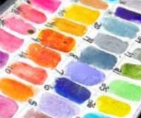 A colorful paint palette with a number 12 on it.