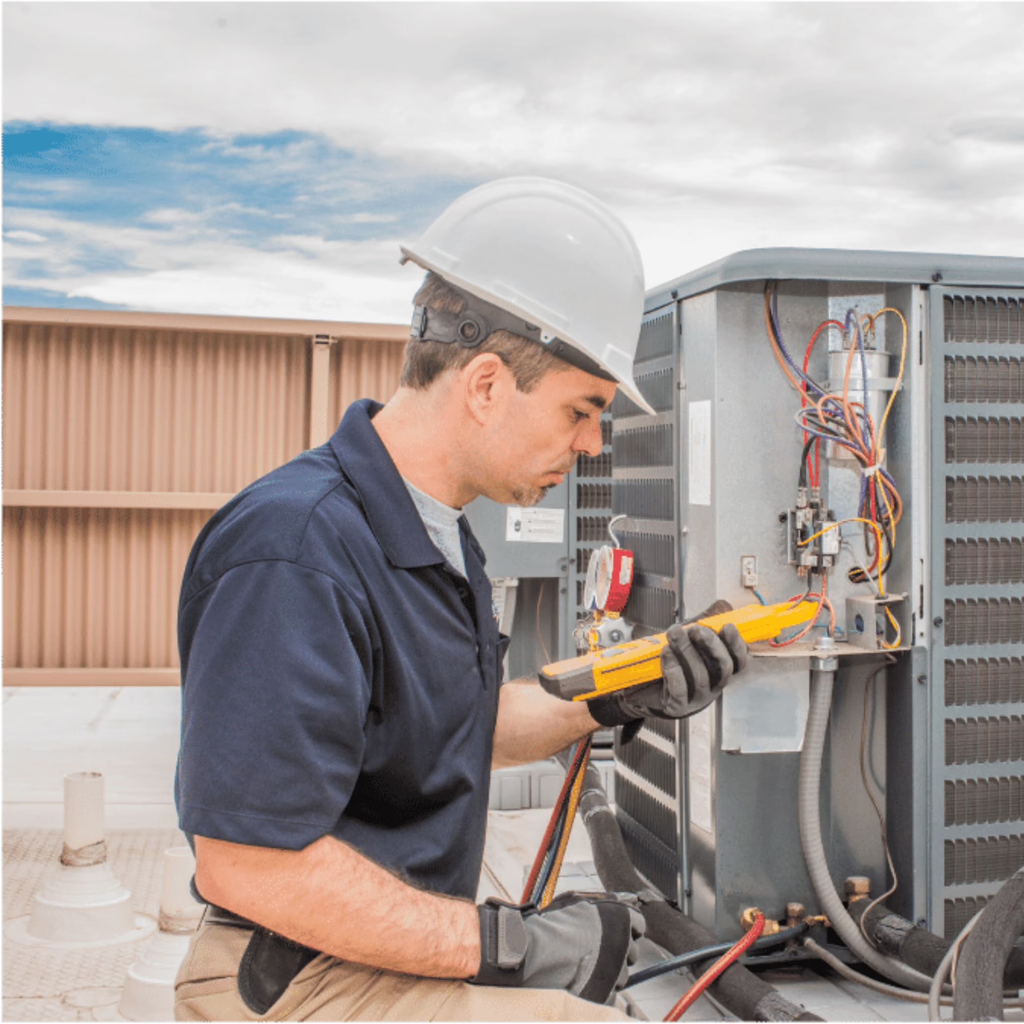 Home services - HVAC technician working on air conditioner