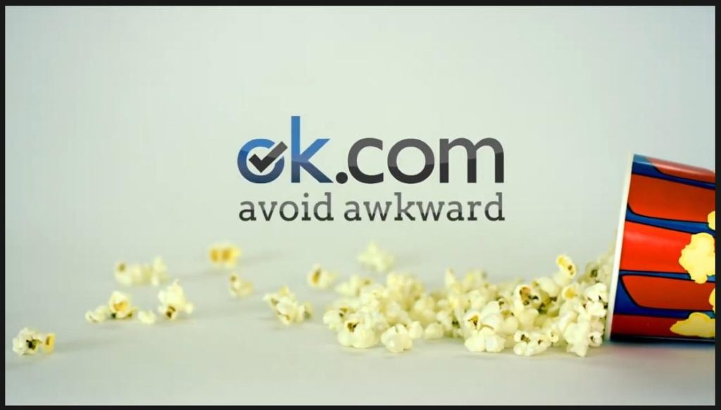 ok.com ad with spilled popcorn and the tagline “avoid awkward,” promoting smoother experiences.